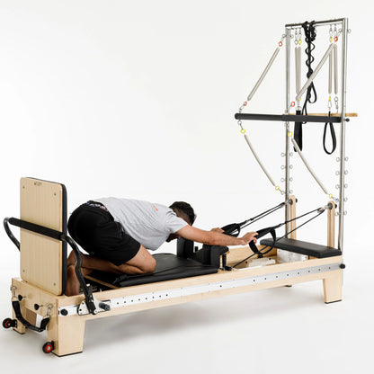 pilates reformer à tour trapèze