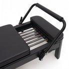 Pilates reformer aluminium total black, barre de pieds et ressorts