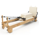 Pilates reformer classique blanc lacté, sitting box et jumpboard