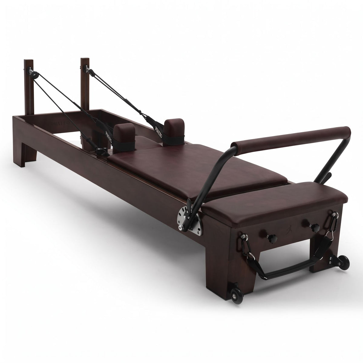 Pilates reformer Prestige bordeaux, vue de trois quarts côté barre de pieds