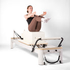 pilates reformer aluminium et cuir beige