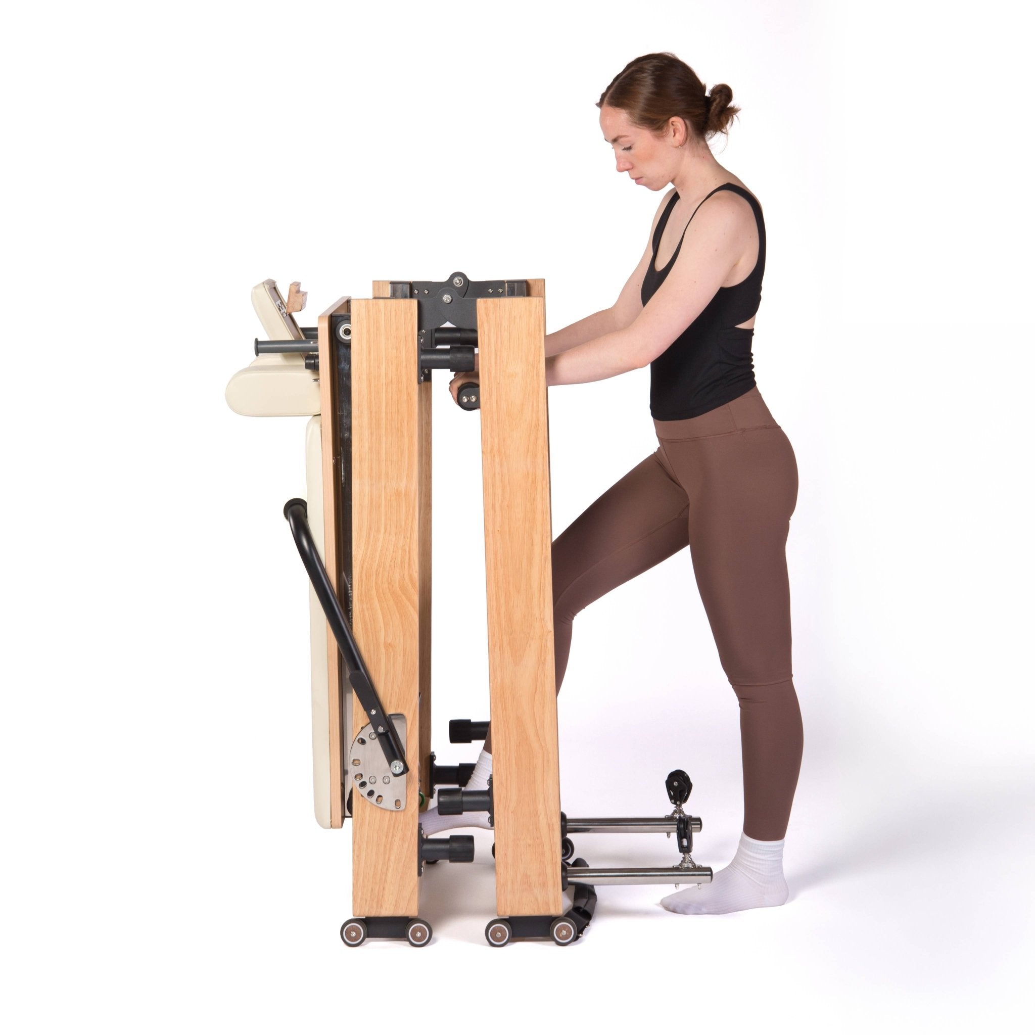 pilates reformer beige qui se plie