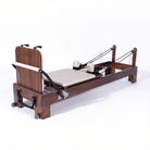 pilates reformer marron bois de noyer