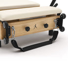 Pilates reformer pliable Flexi blanc lacté, roues