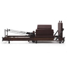 Pilates reformer pliable Flexi espresso bordeaux, vue latérale avec sitting box